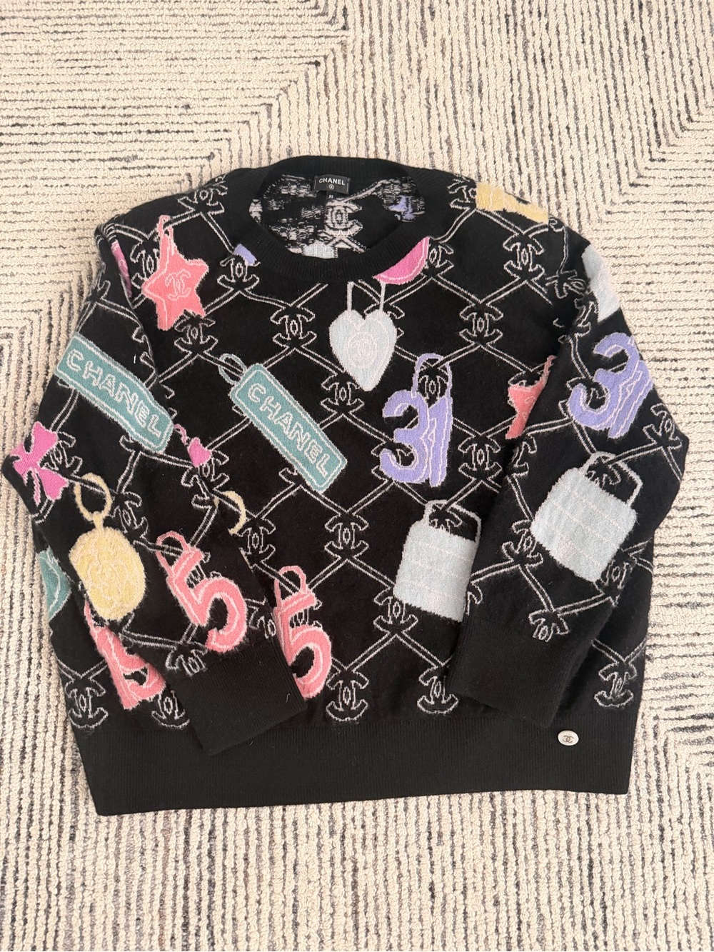 CHANEL Black Crewneck Sweater with Pastel Logo & Charm Motifs